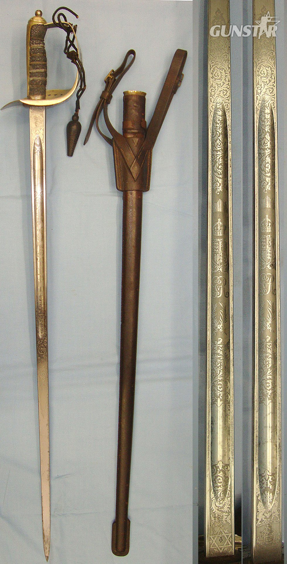  NAMED**British WD WW1 1915 George V 1897 Pattern British Fenton Brothers Sheffield Presentation Sword With Blued & Etched Blade To ‘Harry L. Searle, Commander D' Company, 1st Battn. B.C.V.F, Cord, Acorn Knot & Leather Field Scabbard & Sam Browne Frog. S Sword