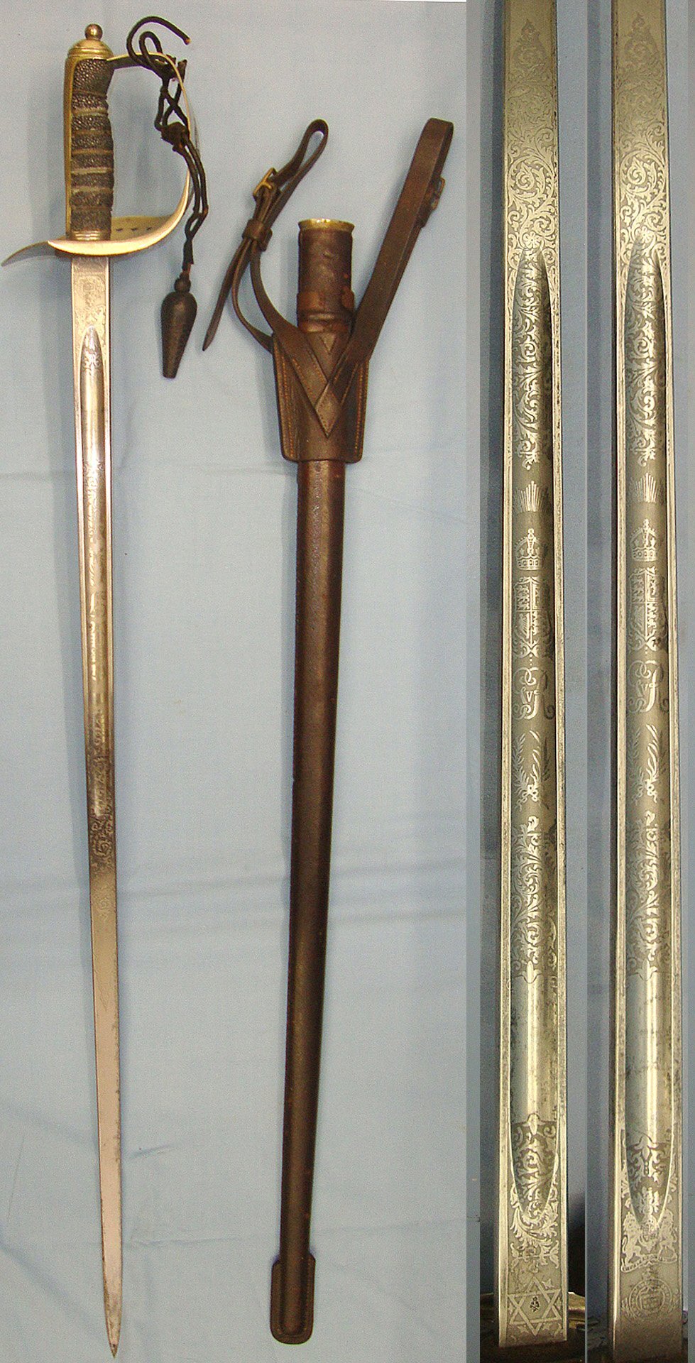  NAMED**British WD WW1 1915 George V 1897 Pattern British Fenton Brothers Sheffield Presentation Sword With Blued & Etched Blade To ‘Harry L. Searle, Commander D' Company, 1st Battn. B.C.V.F, Cord, Acorn Knot & Leather Field Scabbard & Sam Browne Frog. S Sword