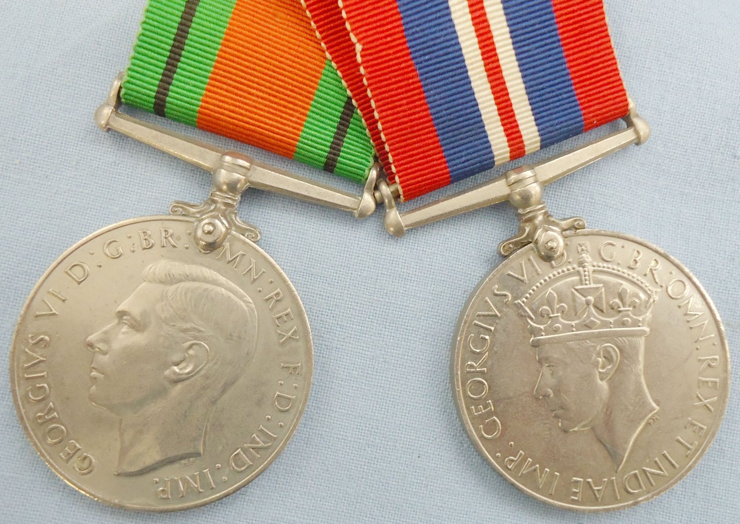  WWII Pair – The Defence Medal & The War Medal 1939-1945. BA 451. WWII Pair – The Defence Medal & The War Medal 1939-1945. BA 451.  Antique & Militaria