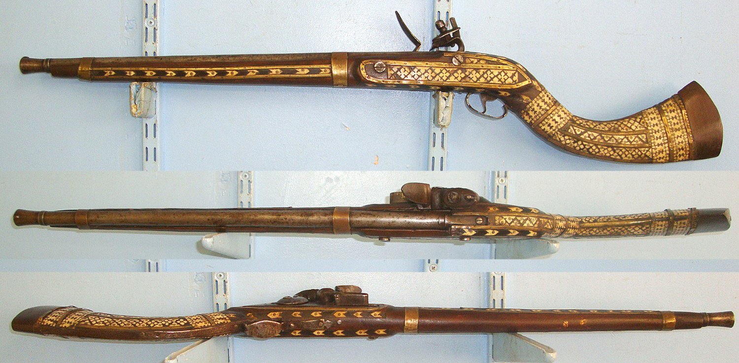  Victorian Era Indian / Afghan North West Frontier 20 Bore Flintlock Jezail Carbine With Late 1700’s / Early 1800’s Georgian Enfield Tower Brown Bess Musket Lock, Wood Stock Ornately Decorated With Polished Bone & Brass Inlays. Sn 23666  jezail Muzzleloader 20 Bore/gauge Rifle