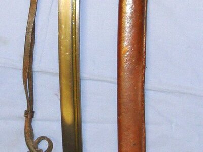BLADE NUMBERED ON SIDE**WW2 Japanese NCO\'s Type 95 Katana by The Lijima Swords Factory with Kokura Arsenal Mark, Original Leather Cord with Barrel Knot and Scabbard with Part of Its Original leather Field Combat Cover. Sn 20332. Sword