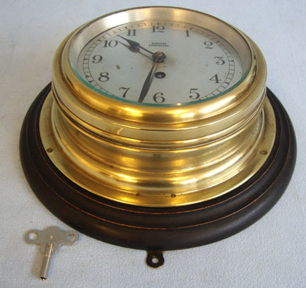 Barkers of Kensington, London Brass Cased Eight Day Naval Bulkhead Clock By Barkers of Kensington, London, Mou Other Accessory