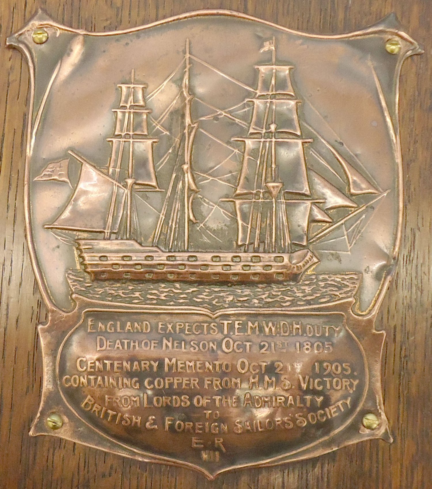 1905 Souvenir Plaque Memento of the Centenary of the Death of Lord Admiral Nelson Original Mounted Piece of Copper Sheathing Plate from the Hull of British War Ship HMS Victory. MISC 1003. 1905 Souvenir Plaque Memento of the Centenary of the Death of Lord Admiral Nelson Original Mounted Piece of Copper Sheathing Plate from the Hull of British War Ship HMS Victory. MISC 1003.  Antique & Militaria
