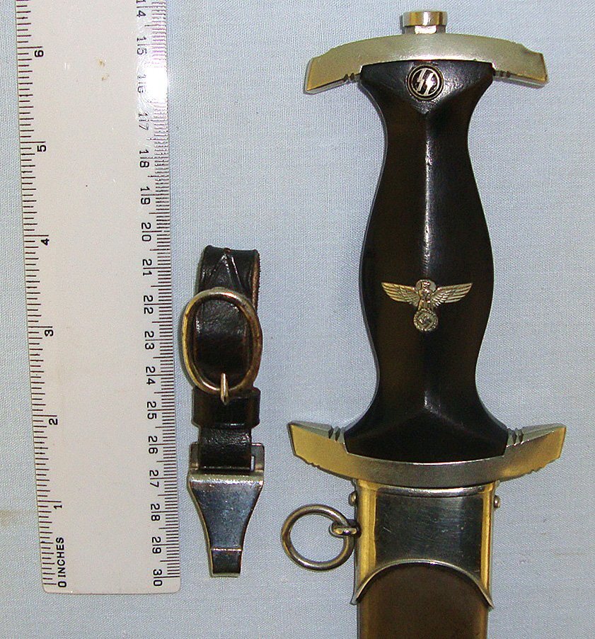 ORIGINAL**INTERMEDIATE PRODUCTION**RARE**WW2 Era Nazi German 1933 Pattern SS Man’s & NSKK Daggers Black Leather Belt Hanger With Nickel Plated Buckle & OLC (Overhoff & Cie Lüdenscheid) Maker & M5/71 Marked Sprung Clip. Sn 23246:1 Dagger