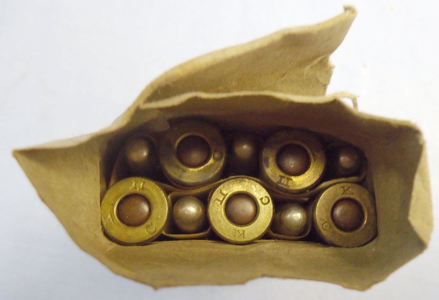 INERT DEACTIVATED. Scarce, British, WW1 Era, Kynoch, 10 Round, .303 Mark II Ball Round in a Mark VII Service Pack. - O 2306 INERT DEACTIVATED. Scarce, British, WW1 Era, Kynoch, 10 Round, .303 Mark II Ball Round in a Mark VII Service Pack. - O 2306 Various Other Ammunition