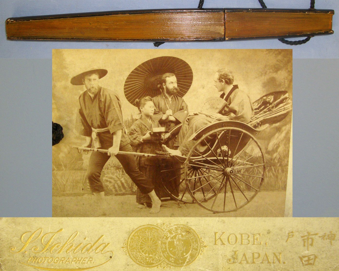 Japanese Meiji Period C 1880’s- 1910 Concealed Fan Tanto Dagger With Cord & Associated Period Sepia Post Card Photograph Of Western Tourists In Japanese Costumes Posing In Village Rickshaw Scene Attended By A Japanese Servant By Photographer Schida. Sn  Dagger