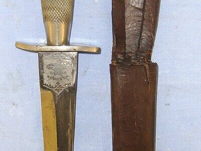 VERY RARE**British 1st Pattern Wilkinson FS Commando Fighting Knife With Double Etched Panels & 1st Pattern Scabbard With Correct Newey Stud Fastener. Sn 23484:95 Knive