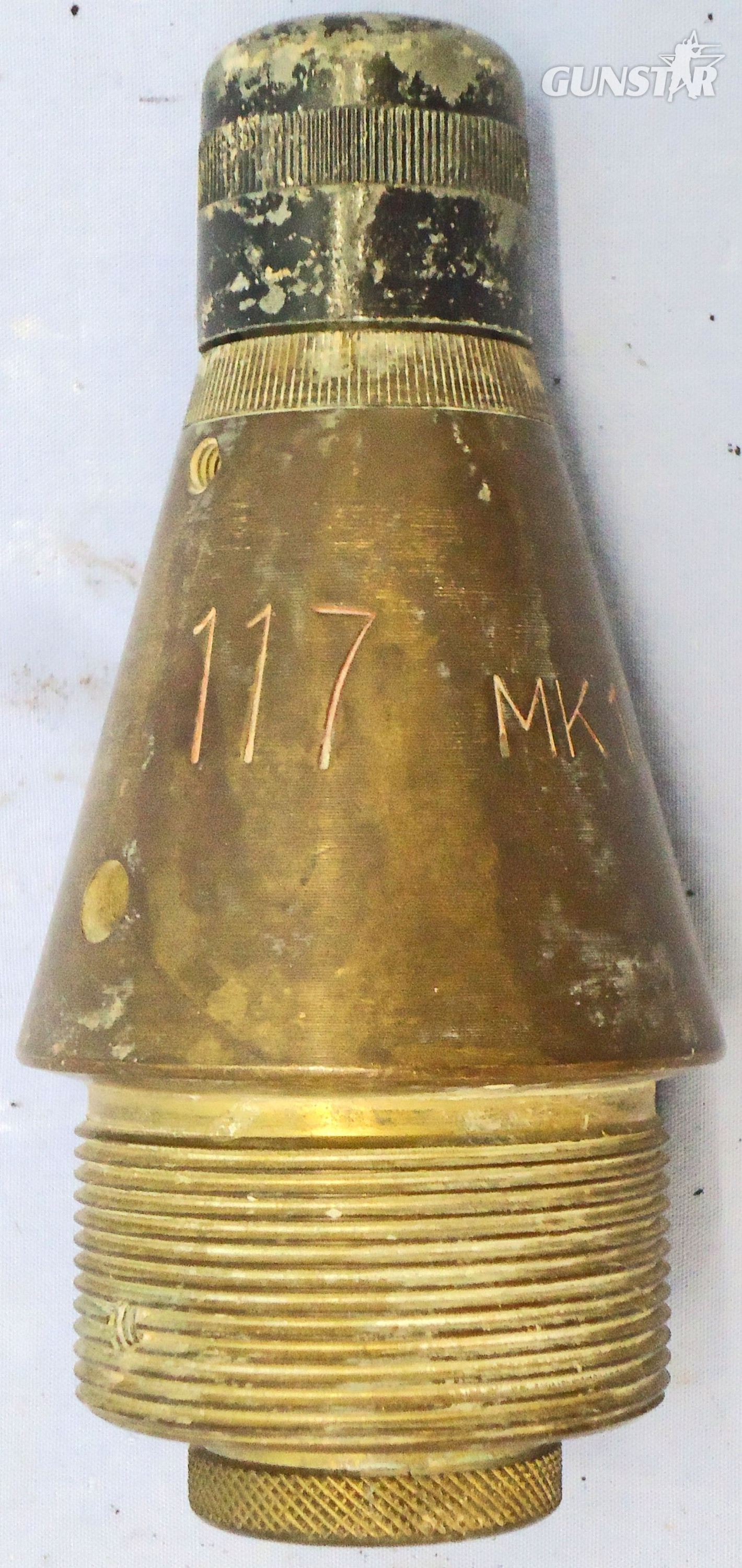 INERT DEACTIVATED. British, Quarter Sectioned, Instruction, No 117 MK 17/6 Impact Nose Fuze For British High Explosive Projectiles. - O 2123 INERT DEACTIVATED. This is a British No 117 Mark 17/6 nose impact fuze which has had a quarter section taken out of it for instruction purposes to reveal the inner workings. The fuze was used for British high explosive artillery projectiles. This brass in  Other Ammunition - {CATEGORY}