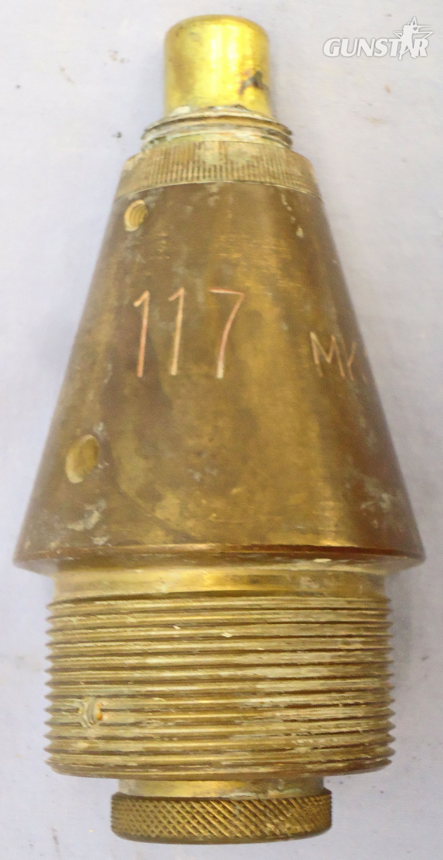 {CATEGORY} - INERT DEACTIVATED. British, Quarter Sectioned, Instruction, No 117 MK 17/6 Impact Nose Fuze For British High Explosive Projectiles. - O 2123 INERT DEACTIVATED. This is a British No 117 Mark 17/6 nose impact fuze which has had a quarter section taken out of it for instruction purposes to reveal the inner workings. The fuze was used for British high explosive artillery projectiles. This brass in  Other Ammunition in 