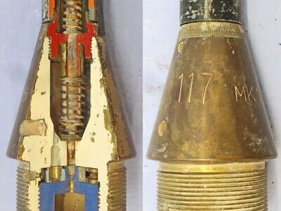 INERT DEACTIVATED. British, Quarter Sectioned, Instruction, No 117 MK 17/6 Impact Nose Fuze For British High Explosive Projectiles. - O 2123 INERT DEACTIVATED. This is a British No 117 Mark 17/6 nose impact fuze which has had a quarter section taken out of it for instruction purposes to reveal the inner workings. The fuze was used for British high explosive artillery projectiles. This brass in  Other Ammunition