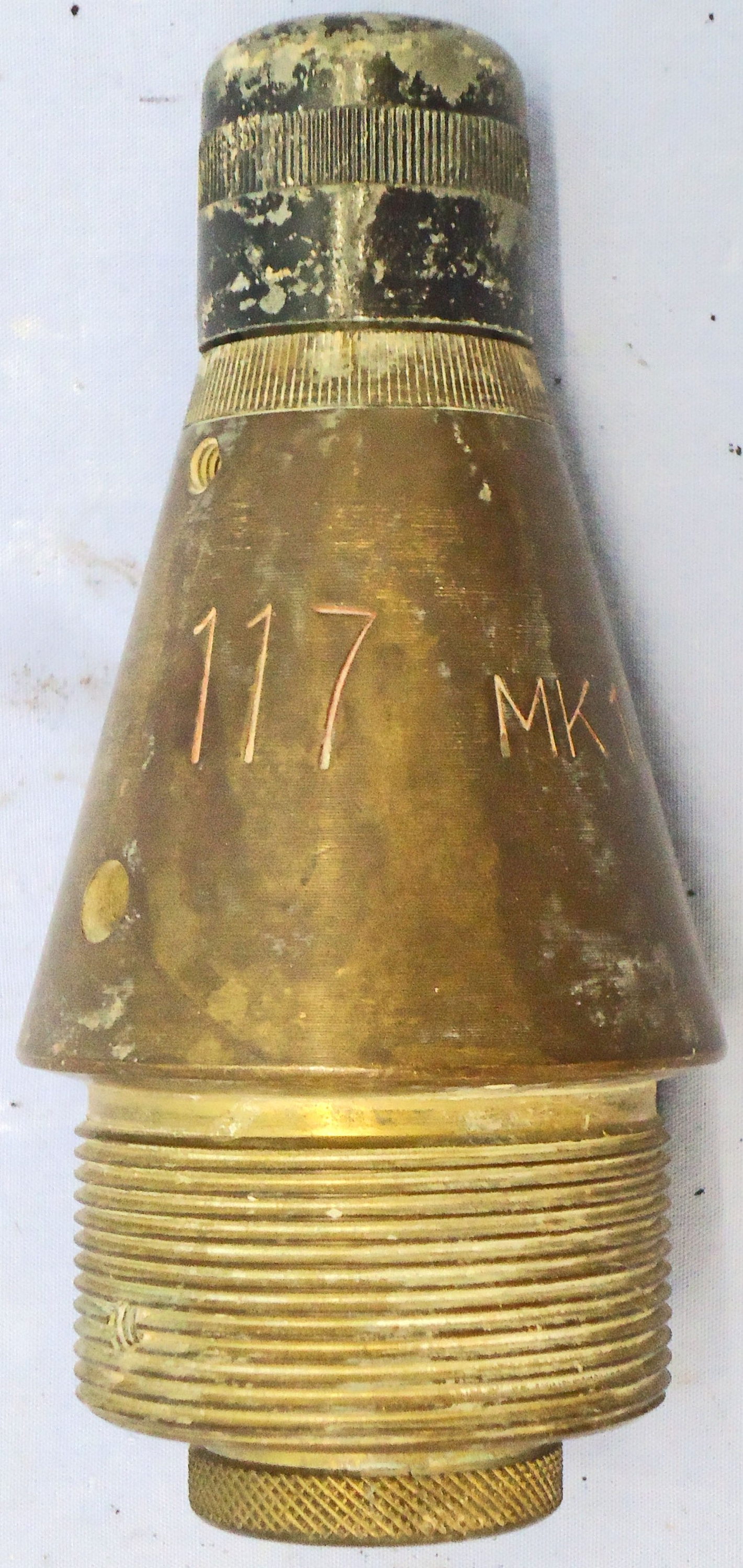 INERT DEACTIVATED. British, Quarter Sectioned, Instruction, No 117 MK 17/6 Impact Nose Fuze For British High Explosive Projectiles. - O 2123 INERT DEACTIVATED. This is a British No 117 Mark 17/6 nose impact fuze which has had a quarter section taken out of it for instruction purposes to reveal the inner workings. The fuze was used for British high explosive artillery projectiles. This brass in  Other Ammunition - {CATEGORY}