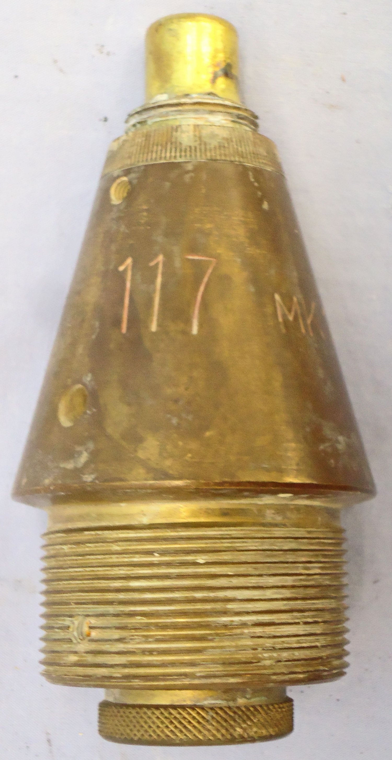 {CATEGORY} - INERT DEACTIVATED. British, Quarter Sectioned, Instruction, No 117 MK 17/6 Impact Nose Fuze For British High Explosive Projectiles. - O 2123 INERT DEACTIVATED. This is a British No 117 Mark 17/6 nose impact fuze which has had a quarter section taken out of it for instruction purposes to reveal the inner workings. The fuze was used for British high explosive artillery projectiles. This brass in  Other Ammunition in 
