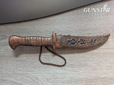 Ornately marked Middle Eastern or Indian dagger in copper or brass finish with stainless steel blade Dagger