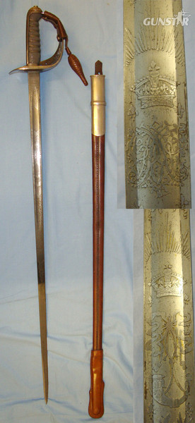  QUALITY MAKER**Boer War Era British Robert Mole & Sons Birmingham 1897 Pattern Rifle Brigade Officers Sword With Etched Blade Number M2697 Press Stud Hilt Fitting With Acorn, Scabbard & Period Photograph Of An Officer In Uniform With Sword Sword