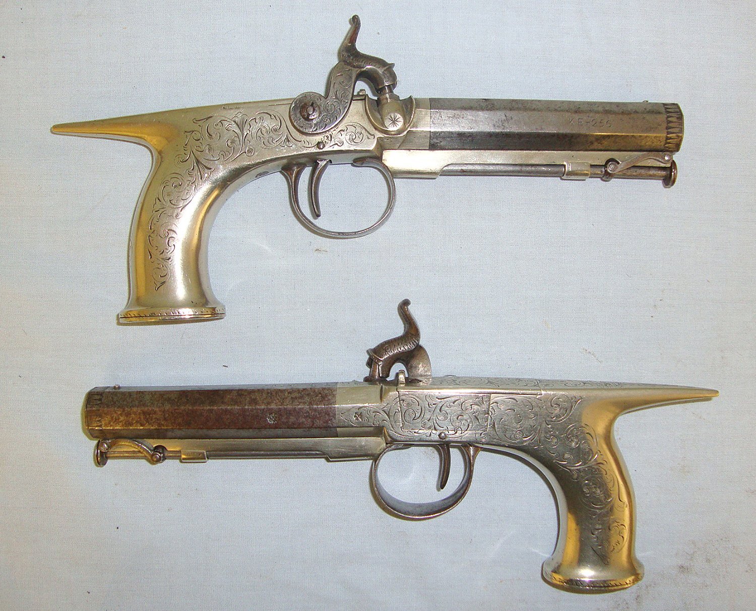 1830 Pair Of Scottish Form 54 Bore German Silver & Steel Construction Saw Handle Percussion Pistols With 1843-1846 Irish Registration Marks ‘KE-256’(County Kerry) Octagonal Barrels & Captive Steel Ram Rods. Sn 18241 percussion pistols .54 Cal Muzzleloader Single Shot