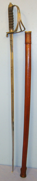  WW1 Era British WD Royal Artillery Officer’s 1821 Pattern Sword With Nickel Plated Steel Hilt & Etched Regiment Blade With King’s Crown ‘GRV’ Royal Cypher & Leather Covered Wood Field Scabbard. Sword