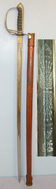 WW1 Era British WD Royal Artillery Officer’s 1821 Pattern Sword With Nickel Plated Steel Hilt & Etched Regiment Blade With King’s Crown ‘GRV’ Royal Cypher & Leather Covered Wood Field Scabbard. Sword