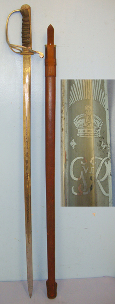  WW2 Era 1939 British Officer’s Army & Navy Stores London 1821 Pattern Presentation Sword With Etched Blade To ‘Lieut P.T Bevan RASC (Royal Army Service Corps) To Lieut T.H Wilkinson 1.5.39’ With Leather Covered Field Service Scabbard. Sword