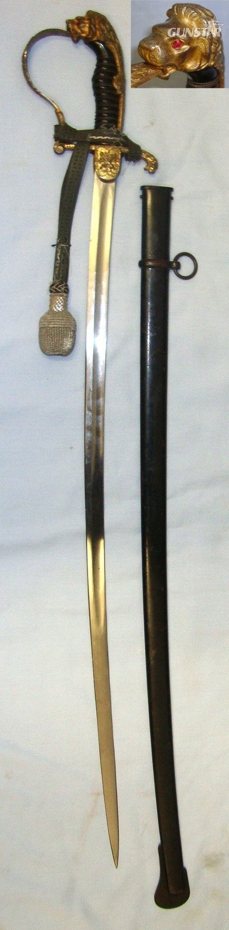 WW1 Era Imperial German Artillery Officer Dress Sword With Lion’s Head ‘Jewelled’ Eyes Pommel Officer’s Cord & Portepee & Scabbard. ED 3021 Sword in 