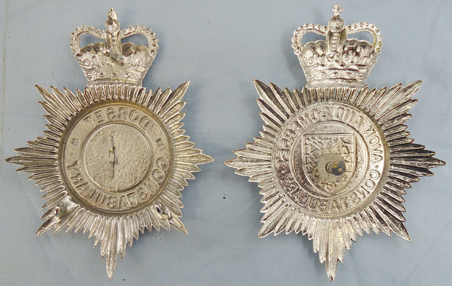 Pair* Dorset Constabulary & Avon and Somerset Constabulary Helmet Plates. BA 887. Pair* Dorset Constabulary & Avon and Somerset Constabulary Helmet Plates. BA 887.  Antique & Militaria