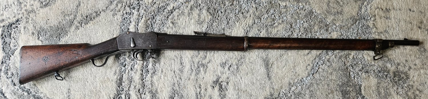  Martini–Enfield Martini-Henry  Mk1 1873, Matching numbers (3114) bronze axis pin, Checkered Butt plate, 3 Stap Swivels. Lovely original Rifle in Original conditionand full working order with Originals White Strap. Lever Action .577 Rifle