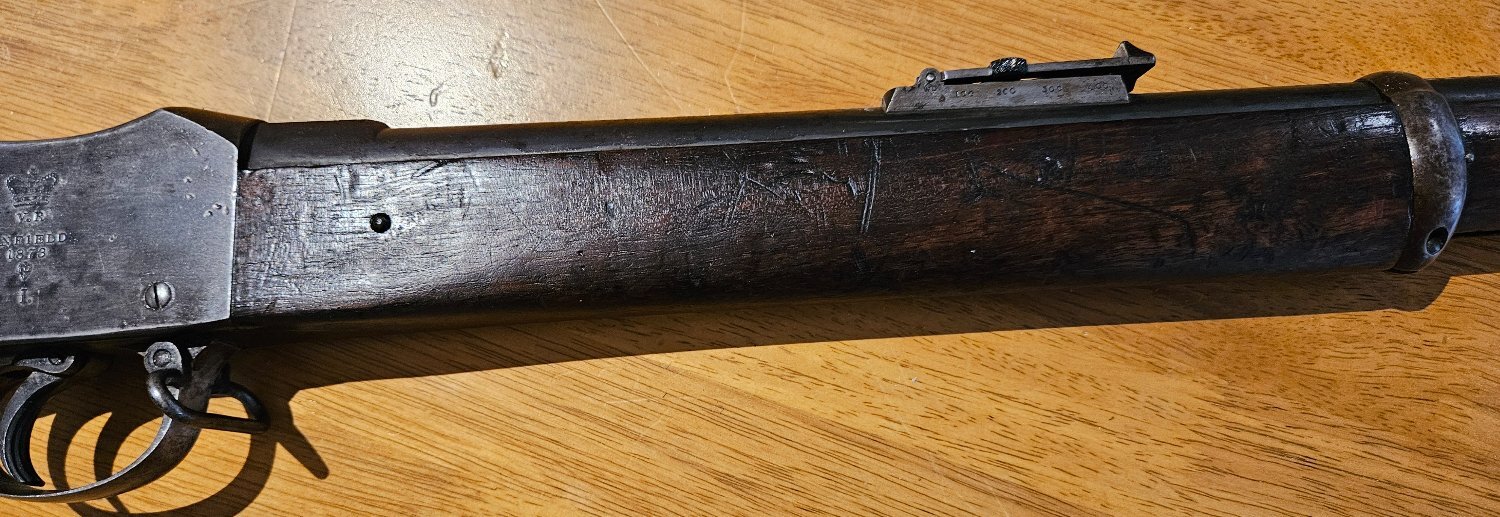 {CATEGORY} - Martini–Enfield Martini-Henry  Mk1 1873, Matching numbers (3114) bronze axis pin, Checkered Butt plate, 3 Stap Swivels. Lovely original Rifle in Original conditionand full working order with Originals White Strap. Lever Action .577 Rifle in 
