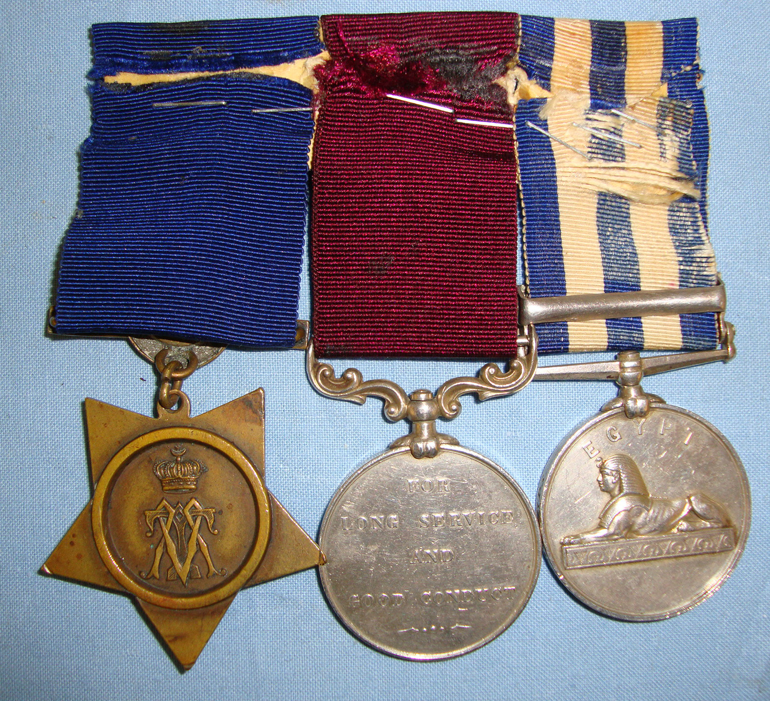  Named Victorian British Medal Trio Egypt 1882-89 Medal With Suakin 1885 Bar, Khedive’s Star 1884-86 Army Long Service & Good Conduct Medal (2nd Type) To Sgt Major M. Mc Inerny Medical Staff Corps With Ribbons Mounted For Wear & Copy Of Staff List. - 160  Other Accessory