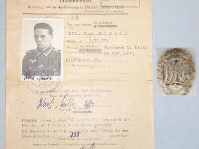 Original German WWII D.R.L. Sports Silver with Gold Badge maker marked “Wernstein, Jena” and Multi-Stamped Deutsche Reichssportabzeichen Certificate to a Uffz. Karl Muller Dated 1944. N 177. Original German WWII D.R.L. Sports Silver with Gold Badge maker marked “Wernstein, Jena” and Multi-Stamped Deutsche Reichssportabzeichen Certificate to a Uffz. Karl Muller Dated 1944. N 177. Antique & Militaria