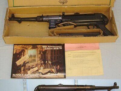 BOXED**FIREARMS QUALITY BEST REPLICA**Of The Iconic WW2 Nazi German MP40 9mm Sub Machine Gun With Folding Stock By The Model Gun Company of Japan (MGC). **COCKS & DRY FIRES**THIS MODEL DOES NOT EJECT DUMMY SHELLS** Sn 23658:1  replica machine gun - Non-firing