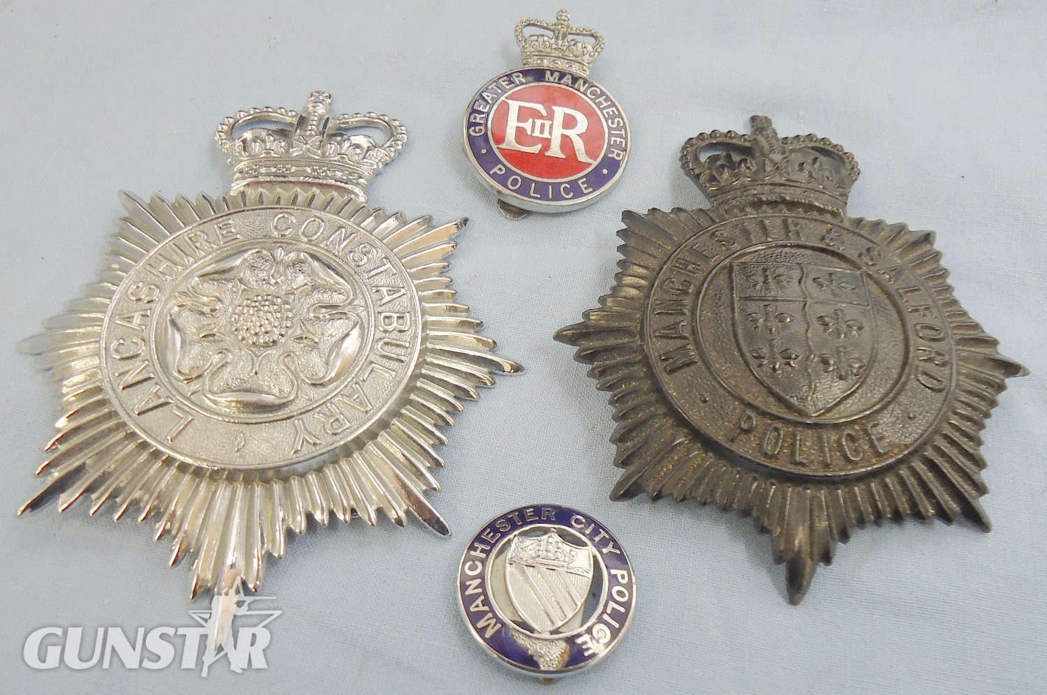 Set* Lancashire Constabulary, Manchester & Salford Police Helmet Plates and Manchester City Police and Greater Manchester Police Cap Badges. BA 889. Set* Lancashire Constabulary, Manchester & Salford Police Helmet Plates and Manchester City Police and Greater Manchester Police Cap Badges. BA 889.  Antique & Militaria