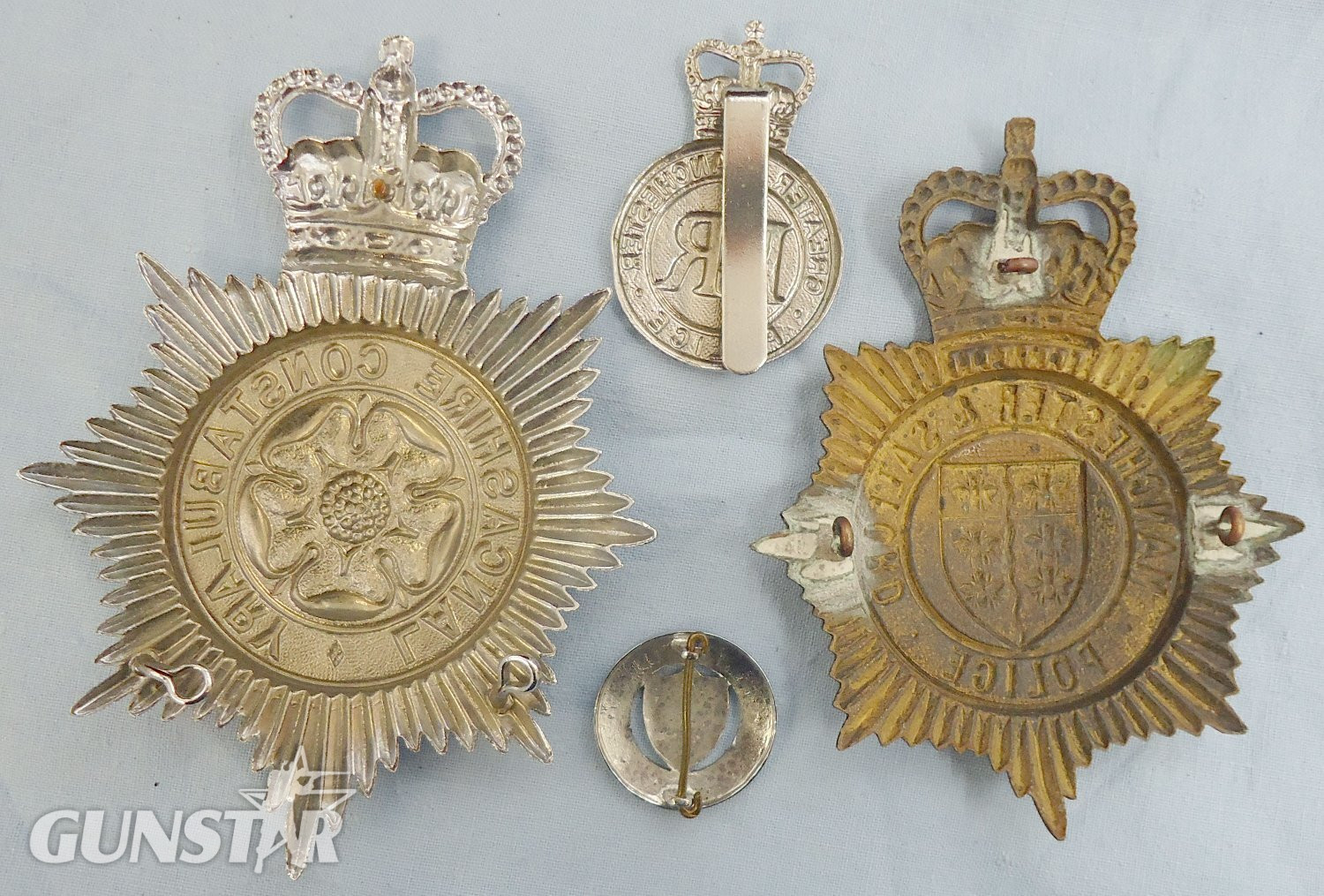  Set* Lancashire Constabulary, Manchester & Salford Police Helmet Plates and Manchester City Police and Greater Manchester Police Cap Badges. BA 889. Set* Lancashire Constabulary, Manchester & Salford Police Helmet Plates and Manchester City Police and Greater Manchester Police Cap Badges. BA 889.  Antique & Militaria