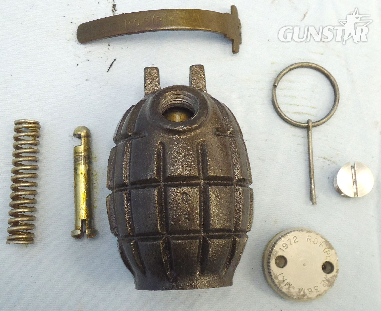  INERT DEACTIVATED. MINT. 1972 Dated Mills No 36M MK1, Last Contract Production for Commonwealth Forces Hand Grenade Made at ROF P (Royal Ordnance Factory) Patricroft. O 2414 INERT DEACTIVATED. MINT. 1972 Dated Mills No 36M MK1, Last Contract Production for Commonwealth Forces Hand Grenade Made at ROF P (Royal Ordnance Factory) Patricroft. O 2414 Various Other Ammunition