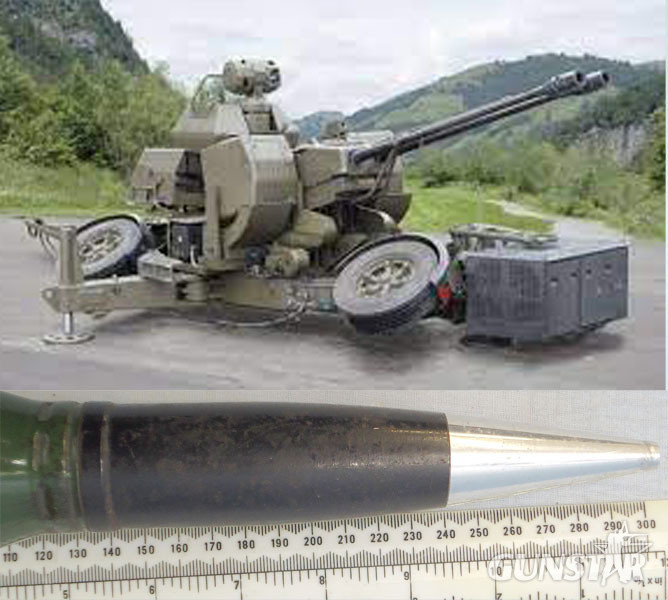  INERT DEACTIVATED. Unfired Oerlikon 35mm KDC (35x228) Practice Round. - O 1724 INERT DEACTIVATED. Unfired Oerlikon 35mm KDC (35x228) Practice Round. - O 1724  Other Ammunition