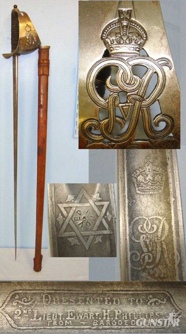 NAMED**WW1 Era British Fenton Brothers Ltd Sheffield George V 1897 Pattern Sword with Presentation Etched Blade ‘Presented To 2nd Lieut Ewart H Philips from Bargoed’ & Field Service Scabbard. ED 2683. Sword in 