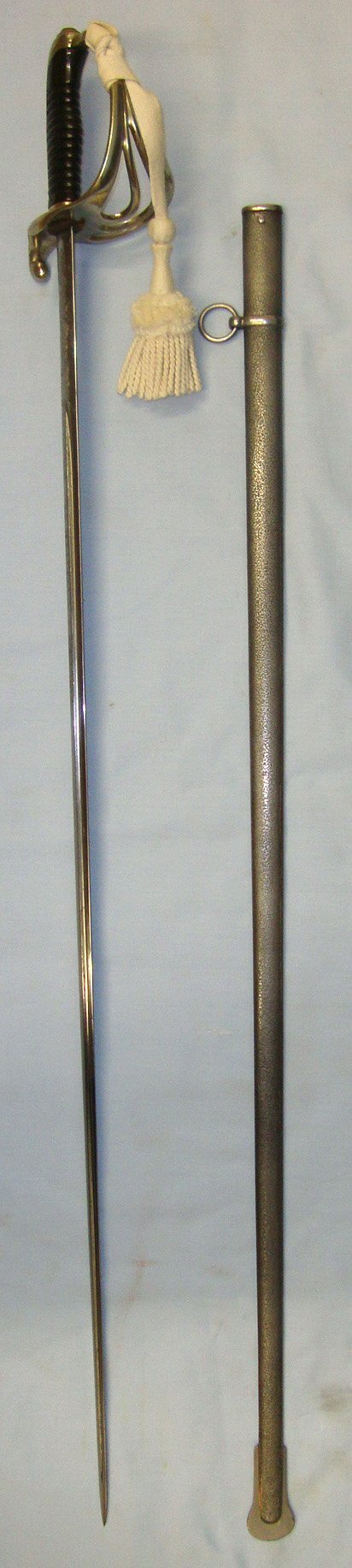  WW1 Era 1913 Dated French Chatellerault Arsenal 1882 Pattern Infantry Officer’s Flag Promotion / Commission Family Presentation Sword With Nickel Plated Brass Hilt, Etched Blade Retailed By Petitfils Paris, Officer’s Rank Tassel Cord & Scabbard. ED 30 Sword
