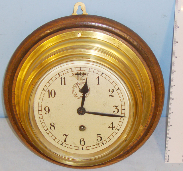  20th Century British Naval Ship\'s Brass Bulkhead Clock With 60 Seconds Time Keeping Feature Mounted On Oak Plaque & Original Key. Sn 13869. 20th Century British Naval Ship\'s Brass Bulkhead Clock With 60 Seconds Time Keeping Feature Mounted On Oak Plaque & Original Key. Sn 13869. Other Accessory