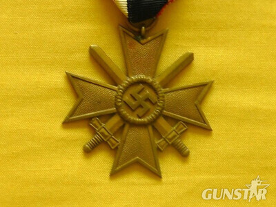 Grossman and Company Early original War Merit Cross second Class with swords and original issue ribbon. Antique & Militaria