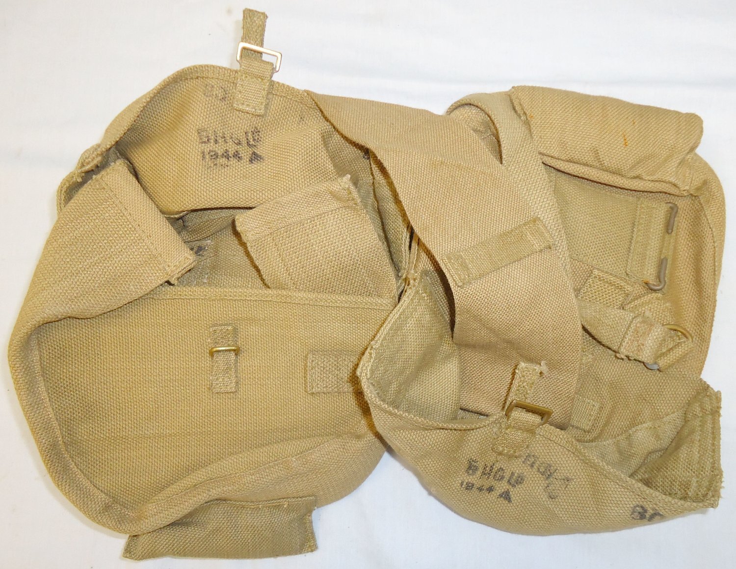 Original 1944 Dated WWII Webley Matching Drum Magazine Pouches for the Vickers ‘K’ Machine Gun used by the S.A.S & L.R.D.G in North Africa, Italy and the Balkans by Maker B.H.G. 22127. Original 1944 Dated WWII Webley Matching Drum Magazine Pouches for the Vickers ‘K’ Machine Gun used by the S.A.S & L.R.D.G in North Africa, Italy and the Balkans by Maker B.H.G. 22127.  Antique & Militaria