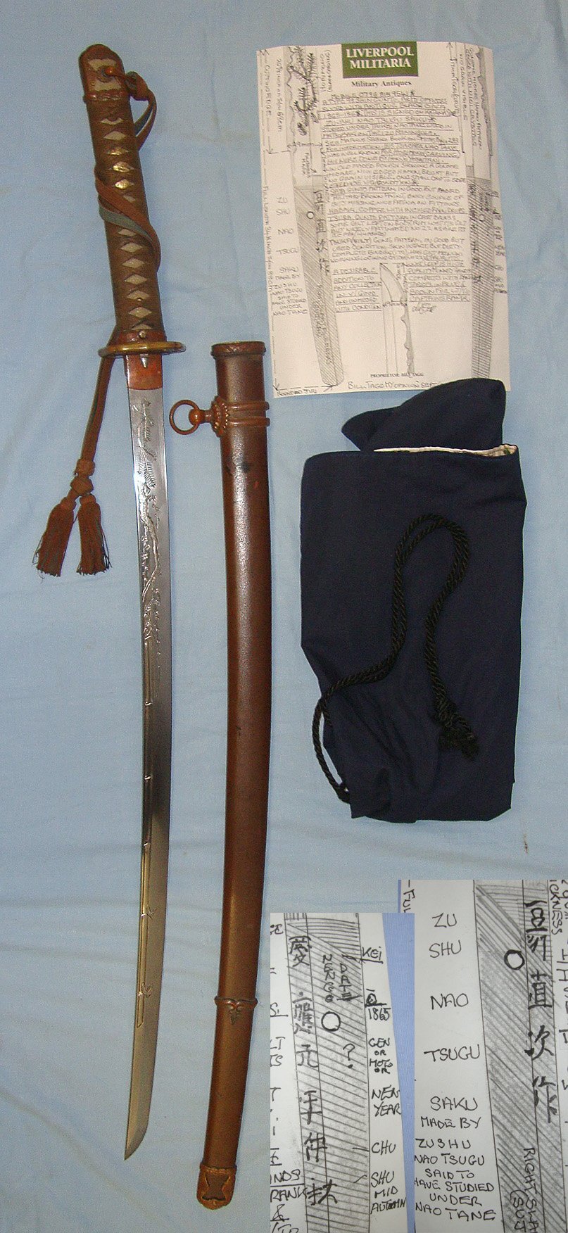 QUALITY HORIMONO CARVED ANTIQUE 1865 DATED BLADE**WW2 Smith Signed Tang ‘Zu Shu Nao Tsugu Saku’ Japanese Army Officer’s Type 98 Gunto Sword, Rank Tassel, Scabbard Bag / Cover & Expert Assessment Sn 23716 Sword