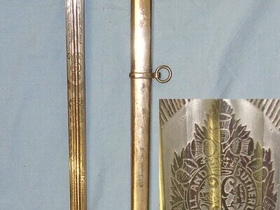 SCARCE & DESIRABLE**WW1 Era King George V British WD Scottish Argyll & Sutherland Highlanders Staff Sergeants / Officer’s Basket Hilt Broadsword With Etched & Blued Panels & Stylised Monogram Blade & Scabbard. Sn 23484:107 Sword
