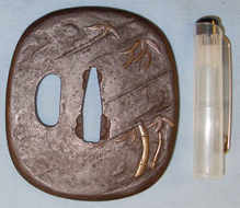 Rounded Square Shaped ‘Katana Tsuba’ in Iron. ED 2692. Rounded Square Shaped ‘Katana Tsuba’ in Iron. ED 2692. Other Accessory