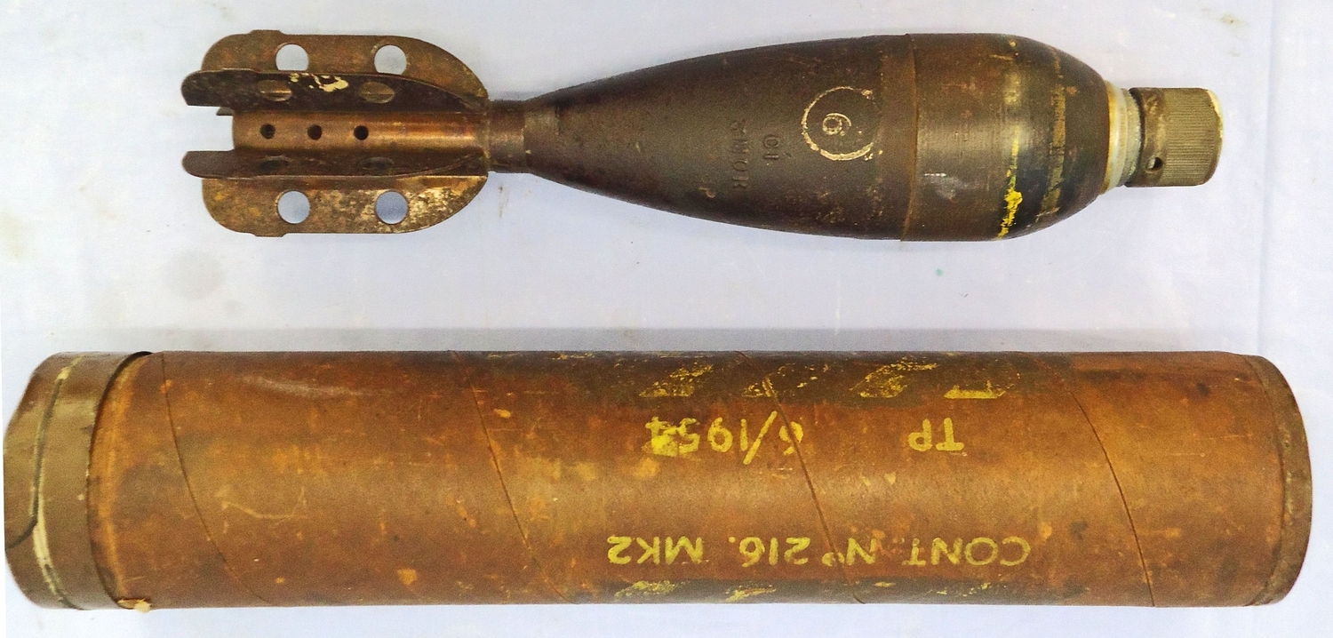 INERT DEACTIVATED. Unfired, Original Korean/Cold War Era, 1954 Dated British 3 Inch Practice High Explosive (HE) Mortar & Original Transit Container. Sn - 21775 INERT DEACTIVATED. Unfired, Original Korean/Cold War Era, 1954 Dated British 3 Inch Practice High Explosive (HE) Mortar & Original Transit Container. Sn - 21775  Other Ammunition - {CATEGORY}