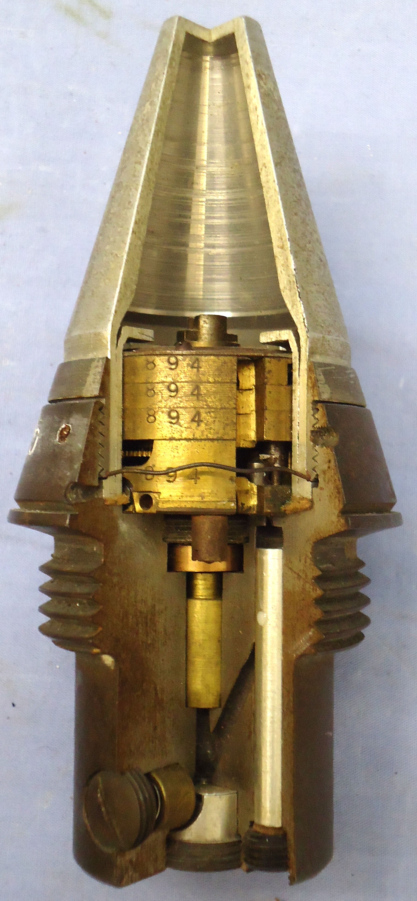 INERT. Very Rare, German, Experimental, 1940 Dated, Factory Sectioned, Railway Gun, Unfired, Dopp Z S45-125 Clockwork Time Fuze In Its Original Bakelite Transit Container. - 21333 INERT. Very Rare, German, Experimental, 1940 Dated, Factory Sectioned, Railway Gun, Unfired, Dopp Z S45-125 Clockwork Time Fuze In Its Original Bakelite Transit Container. - 21333  Other Ammunition 