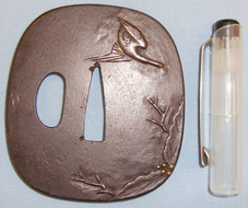 Small ‘Katana’ sized Iron ‘Tsuba’ in a rounded Square Shape. ED 2694. Small ‘Katana’ sized Iron ‘Tsuba’ in a rounded Square Shape. ED 2694. Other Accessory