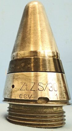 INERT. Scarce, Unfired, WW2, 1942 Dated German ZtZ.S/30 Clockwork Time Fuze In Its Original Bakelite Transit Container.  INERT. Scarce, Unfired, WW2, 1942 Dated German ZtZ.S/30 Clockwork Time Fuze In Its Original Bakelite Transit Container.   Other Ammunition - {CATEGORY}