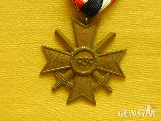Grossman and Company Early original War Merit Cross second Class with swords and original issue ribbon. Antique & Militaria - {CATEGORY}