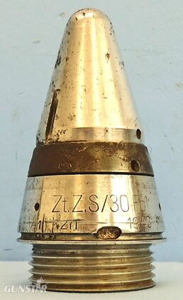 INERT. Scarce, Unfired, WW2, 1943 Dated German ZtZ.S/30 Clockwork Time Fuze In Its Original Bakelite Transit Container. - Sn 21630 INERT. Scarce, Unfired, WW2, 1943 Dated German ZtZ.S/30 Clockwork Time Fuze In Its Original Bakelite Transit Container. Sn 21630  Other Ammunition 
