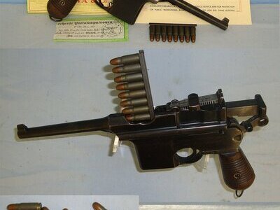 Spanish Civil War & WW2 Era Spanish Astra 1928 Patent Model 900 (Mauser C/96) 7.63mm Calibre 'Broom Handle' Semi Automatic Pistol With Stripper Clip Loaded With Inert Deactivated Rounds, Original Astra Pamphlets & Associated Paperwork. Sn 23668 deactivated pistol None Semi Auto