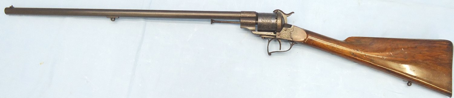 QUALITY** Early Lefaucheux Bte Paris, Model 1854, 12mm Pin Fire Obsolete Calibre Single Action 6 Shot Revolving Rifle with Ornate Foliate Engraving and a Fine Walnut Stock. Sn 23356 QUALITY** Early Lefaucheux Bte Paris, Model 1854, 12mm Pin Fire Obsolete Calibre Single Action 6 Shot Revolving Rifle with Ornate Foliate Engraving and a Fine Walnut Stock. Sn 23356 Single Shot Obsolete Rifle - {CATEGORY}