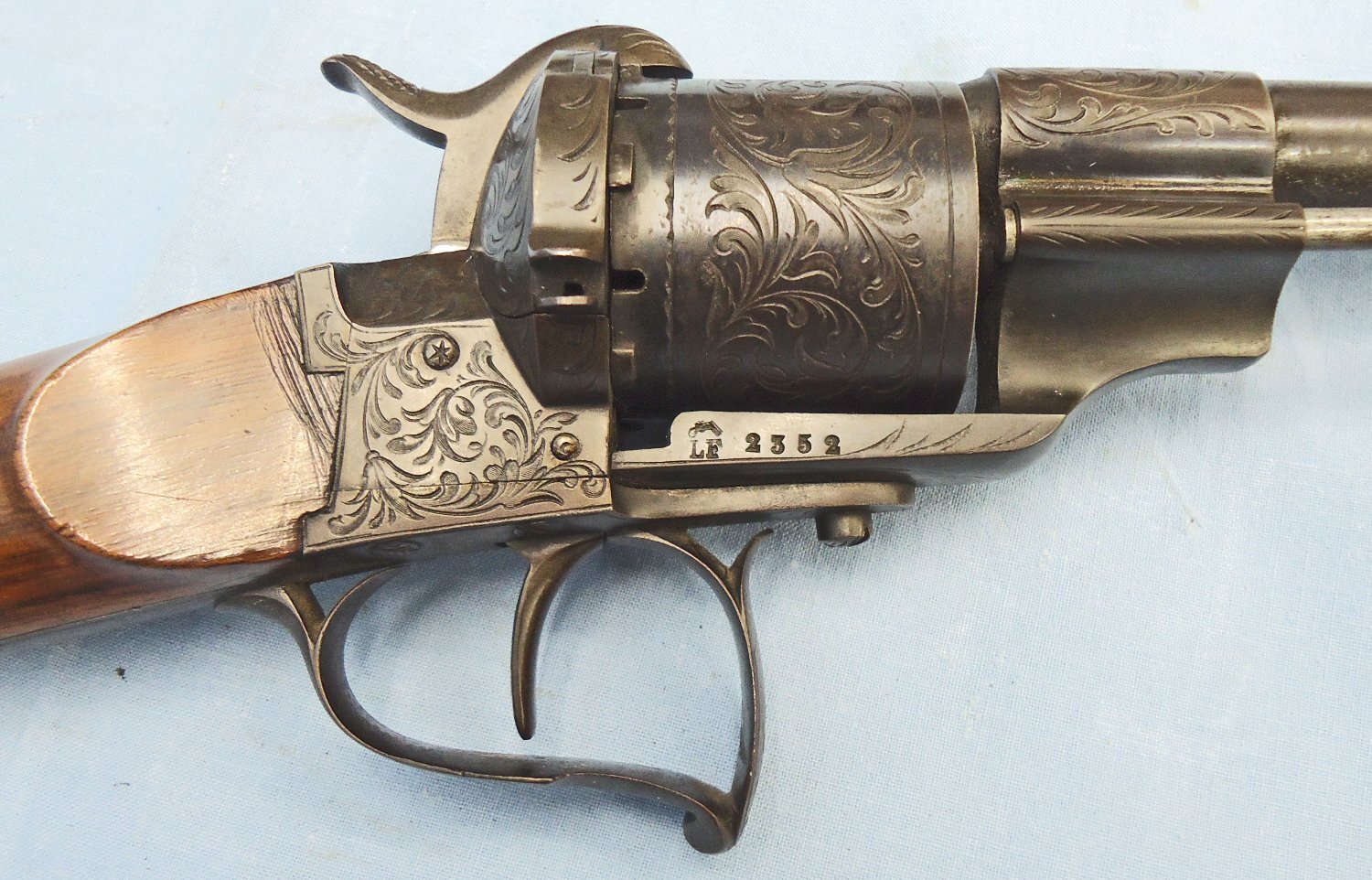 QUALITY** Early Lefaucheux Bte Paris, Model 1854, 12mm Pin Fire Obsolete Calibre Single Action 6 Shot Revolving Rifle with Ornate Foliate Engraving and a Fine Walnut Stock. Sn 23356 QUALITY** Early Lefaucheux Bte Paris, Model 1854, 12mm Pin Fire Obsolete Calibre Single Action 6 Shot Revolving Rifle with Ornate Foliate Engraving and a Fine Walnut Stock. Sn 23356 Single Shot Obsolete Rifle 